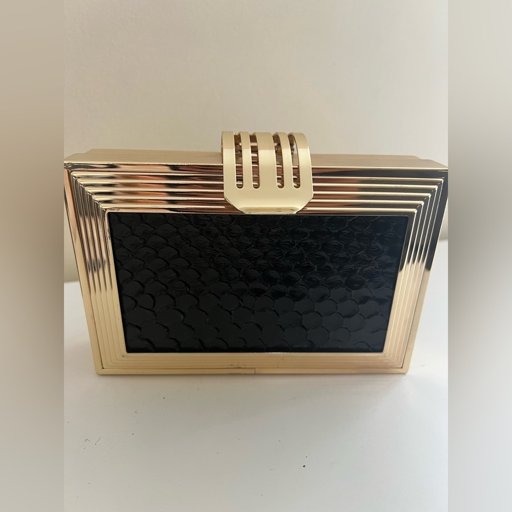 Chic Designer Black and Gold Clutch - Picture 2 of 11